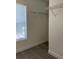 A closet featuring wood-look floors, a window, and wire shelving at 455 Crafton Ct, Lawrenceville, GA 30043
