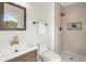 Stylish bathroom features a modern vanity, tiled shower, and sleek fixtures at 197 Holcomb Ferry Rd, Roswell, GA 30076