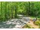 A bicyclist enjoying the scenic trail in the community at 197 Holcomb Ferry Rd, Roswell, GA 30076
