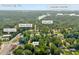 Aerial view of a property near Lake Lanier, Young Deer Creek Park and Dollar General in Cumming, GA at 2560 Fairlane Dr, Cumming, GA 30041