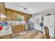Charming kitchen featuring wood cabinets, stainless steel appliances, and a bright window at 2560 Fairlane Dr, Cumming, GA 30041