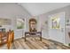 Cozy living room with wood flooring, a bright window, and neutral paint that highlights the space at 2560 Fairlane Dr, Cumming, GA 30041