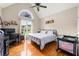Cozy bedroom features a ceiling fan and a large window at 71 Barrington Dr, Hiram, GA 30141