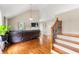 Bright living room with hardwood floors, high ceilings, and a cozy fireplace, perfect for Gathering gatherings at 71 Barrington Dr, Hiram, GA 30141