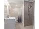 Modern bathroom with a walk-in shower and updated fixtures at 1402 Mclendon Dr, Decatur, GA 30033