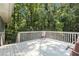 Enjoy nature on this deck that is surrounded by an abundance of trees at 1402 Mclendon Dr, Decatur, GA 30033