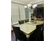 Elegant dining room with large windows, a modern chandelier, and seating for six at 6398 Foggy Oak Dr, Fairburn, GA 30213