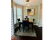 Formal dining room with stylish decor and natural light at 6398 Foggy Oak Dr, Fairburn, GA 30213