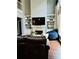 Spacious living room with a fireplace, built-in shelving, and comfortable seating at 6398 Foggy Oak Dr, Fairburn, GA 30213