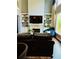 Comfortable living room with a fireplace and built-in shelving at 6398 Foggy Oak Dr, Fairburn, GA 30213