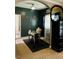 Stylish home office with a desk, chair, and accent decor at 6398 Foggy Oak Dr, Fairburn, GA 30213