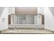 Stylish bathroom featuring a double vanity with granite countertop and decorative mirror with wood accent at 12 Dunwoody Springs Dr # 12, Atlanta, GA 30328