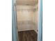 Walk-in closet with shelving and hardwood-style floors providing ample storage at 1570 Jami Hollow Way, Lawrenceville, GA 30043