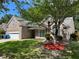 Beautiful home with a well-manicured lawn, driveway, and an attached garage at 1570 Jami Hollow Way, Lawrenceville, GA 30043