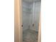 Bright pantry features wire shelving and durable, gray tile flooring for easy maintenance at 1570 Jami Hollow Way, Lawrenceville, GA 30043