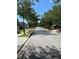 Beautiful tree-lined street with sidewalks and well-maintained homes at 1570 Jami Hollow Way, Lawrenceville, GA 30043