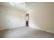 Neutral bedroom with wall-to-wall carpet, closet and doorway to bathroom at 174 Village Dr, Hiram, GA 30141