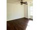 Bedroom featuring hardwood floors and a window letting in natural light at 3306 Chastain Ridge Dr, Marietta, GA 30066