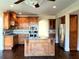 Traditional kitchen with wood cabinets, island, granite countertops, and stainless steel appliances at 3306 Chastain Ridge Dr, Marietta, GA 30066