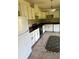 Functional kitchen featuring white cabinets, dark countertops, and updated appliances at 3306 Chastain Ridge Dr, Marietta, GA 30066