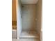 Tiled shower with glass door and fixtures at 3457 Dacite Ct, South Fulton, GA 30349