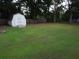 Large, well-maintained backyard with a storage shed and ample green space at 4187 Alaina Cir, Austell, GA 30106