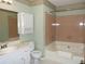 Traditional bathroom featuring a vanity with a sink, toilet, and tub-shower combination at 4187 Alaina Cir, Austell, GA 30106