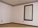 This bedroom shows a window with blinds, neutral carpet, and floral wallpaper accents at 4187 Alaina Cir, Austell, GA 30106