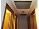 Hallway showcasing hardwood trim around multiple doorways and a ceiling vent at 4187 Alaina Cir, Austell, GA 30106