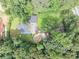 Aerial view of the home and yard at 8035 Rockbridge Rd, Lithonia, GA 30058