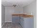 Basement featuring a grey countertop and carpet at 8035 Rockbridge Rd, Lithonia, GA 30058