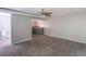 Basement with a half wall, carpet and neutral paint at 8035 Rockbridge Rd, Lithonia, GA 30058