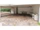 Large carport featuring two ceiling fans and ample space for parking at 8035 Rockbridge Rd, Lithonia, GA 30058