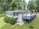 Exterior of home with deck at 8035 Rockbridge Rd, Lithonia, GA 30058