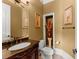 Bathroom featuring a granite countertop and ornate wood vanity at 1310 Settles Rd, Suwanee, GA 30024
