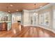 Dining room and bar area with hardwood floors and lots of natural light at 1310 Settles Rd, Suwanee, GA 30024