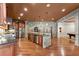 Eat in kitchen with stainless steel appliances, granite countertops and a stone backsplash at 1310 Settles Rd, Suwanee, GA 30024