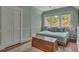This bedroom features hardwood floors, a closet, and large windows at 222 Winonna Dr, Decatur, GA 30030