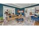 Spacious living room with a comfortable sofa, colorful rug, and ample natural light at 222 Winonna Dr, Decatur, GA 30030