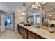 Bright bathroom with double vanity, granite counters, and walk-in shower at 4395 Wildbrooke Pkwy, Cumming, GA 30041