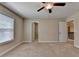 Bedroom with carpet, doors and natural light from the window at 4395 Wildbrooke Pkwy, Cumming, GA 30041