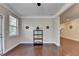 Versatile dining area with natural light, hardwood floors and views to other areas of the home at 4395 Wildbrooke Pkwy, Cumming, GA 30041
