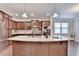 Gourmet kitchen with granite countertops and stainless appliances at 4395 Wildbrooke Pkwy, Cumming, GA 30041
