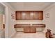 Cozy office space featuring custom built-ins, drawers, and countertop perfect for working at home at 4395 Wildbrooke Pkwy, Cumming, GA 30041