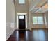 Inviting foyer showcasing hardwood floors, coffered ceilings, and large windows at 1264 Brynhill Ct, Buford, GA 30518