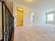 Hallway featuring plush carpet and access to laundry and additional room at 1264 Brynhill Ct, Buford, GA 30518