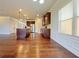 Open kitchen featuring a large island, stainless steel appliances, and hardwood floors at 1264 Brynhill Ct, Buford, GA 30518
