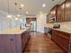 Spacious kitchen featuring granite countertops, stainless steel appliances, and ample cabinet space at 1264 Brynhill Ct, Buford, GA 30518