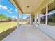 Covered patio with concrete floor, perfect for outdoor entertaining at 1264 Brynhill Ct, Buford, GA 30518