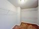 Walk-in closet with wire shelving and neutral carpeting provides ample storage at 1264 Brynhill Ct, Buford, GA 30518